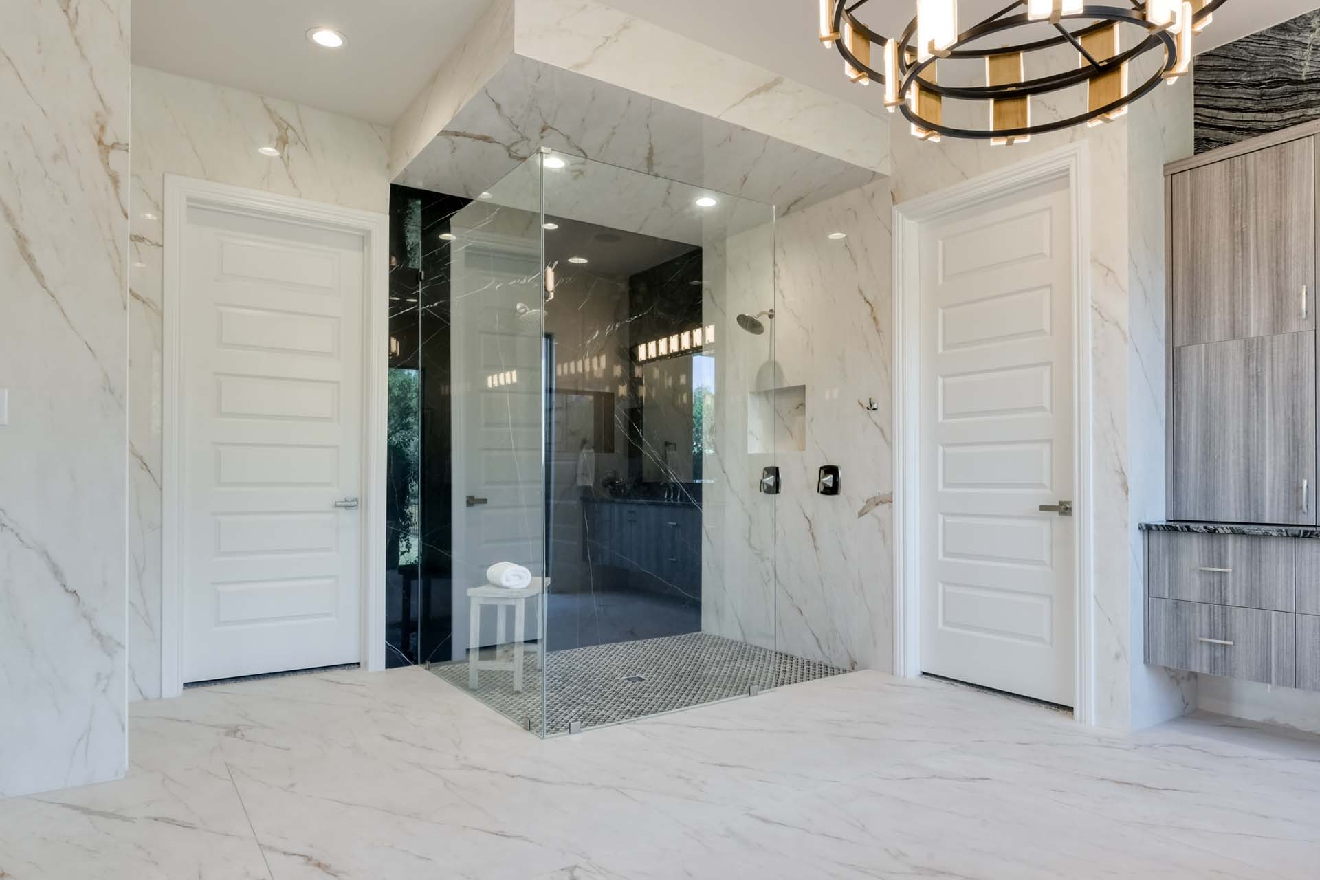 Modern marble bathroom with glass shower