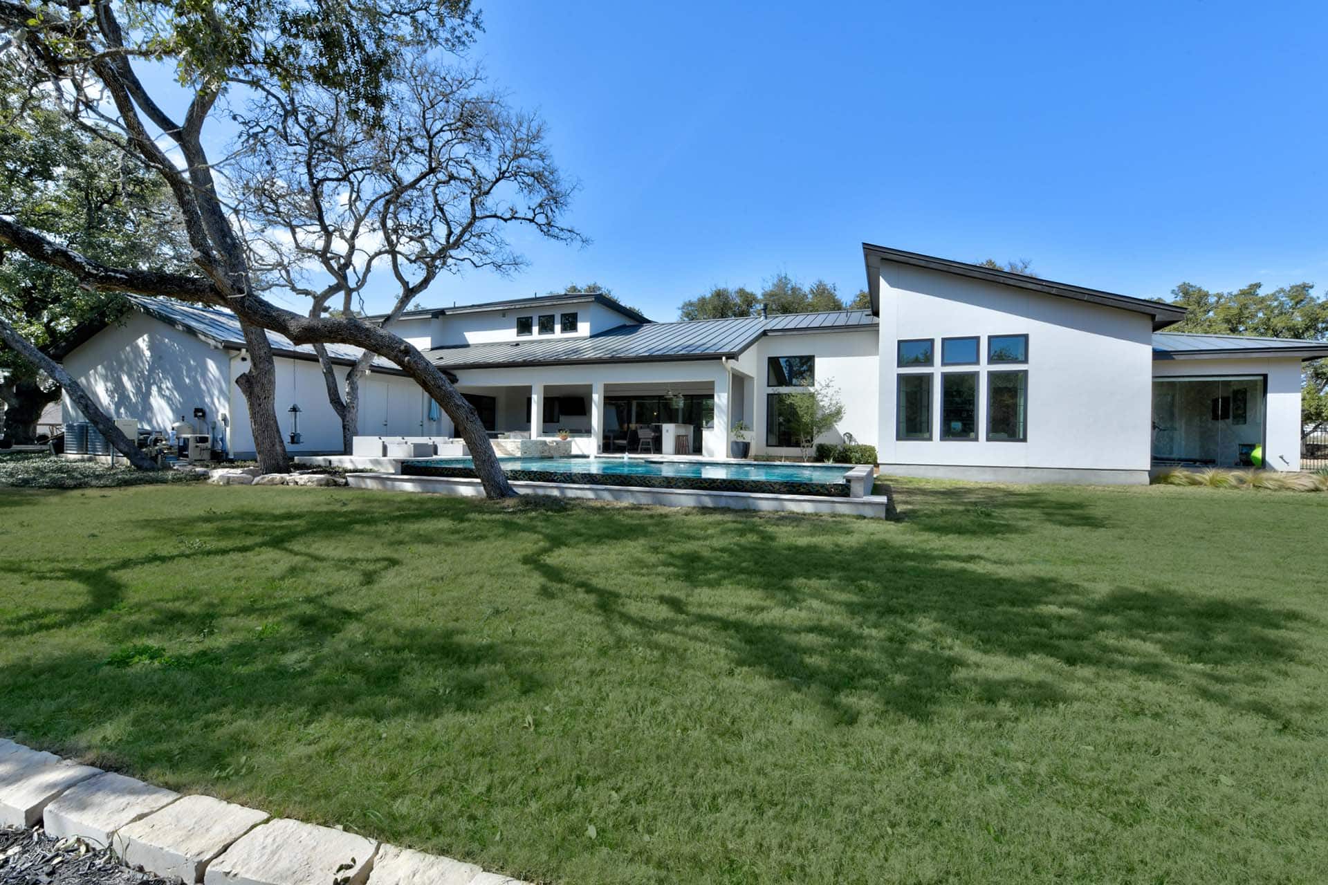 Modern white house with spacious backyard