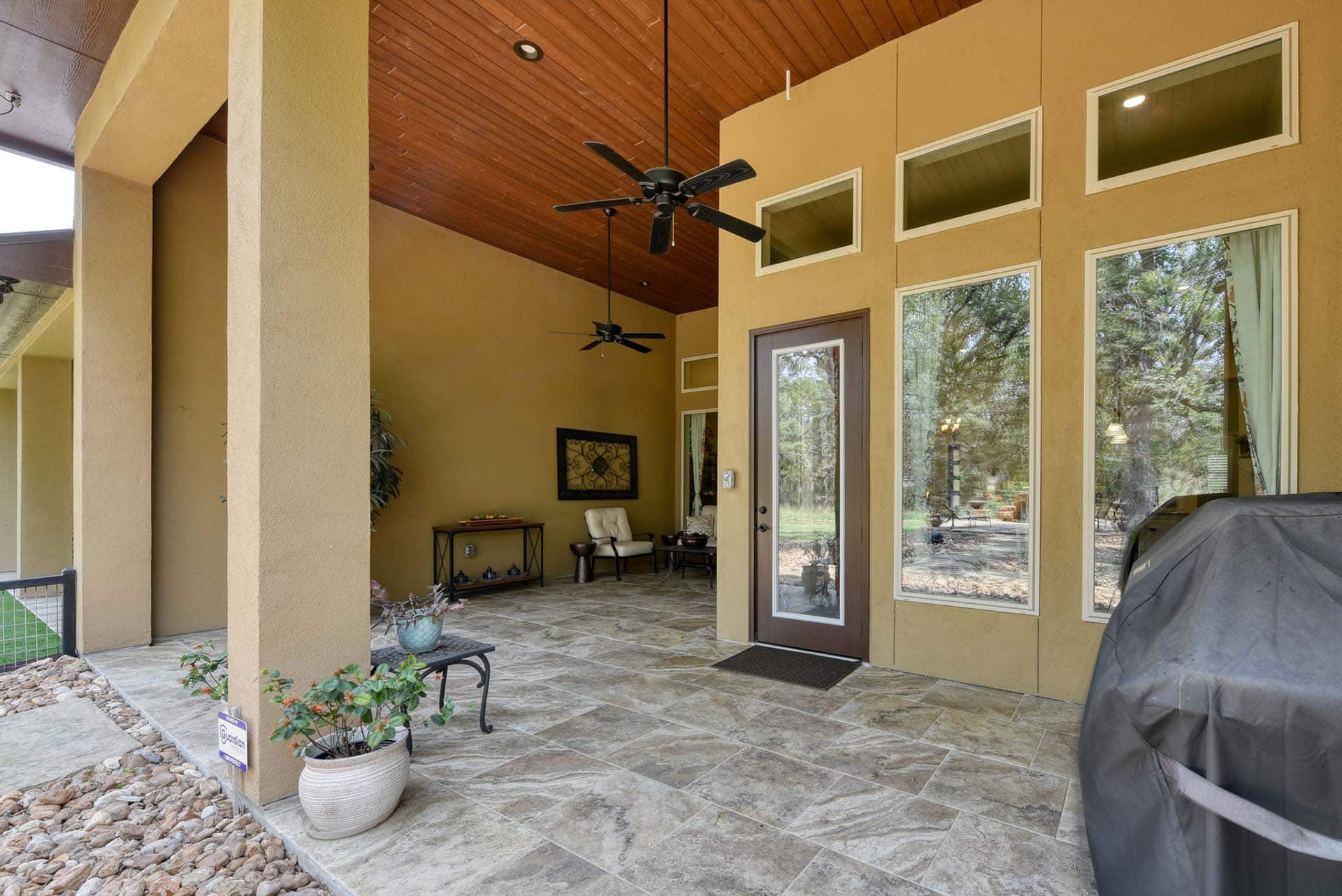 Covered patio with modern design features.